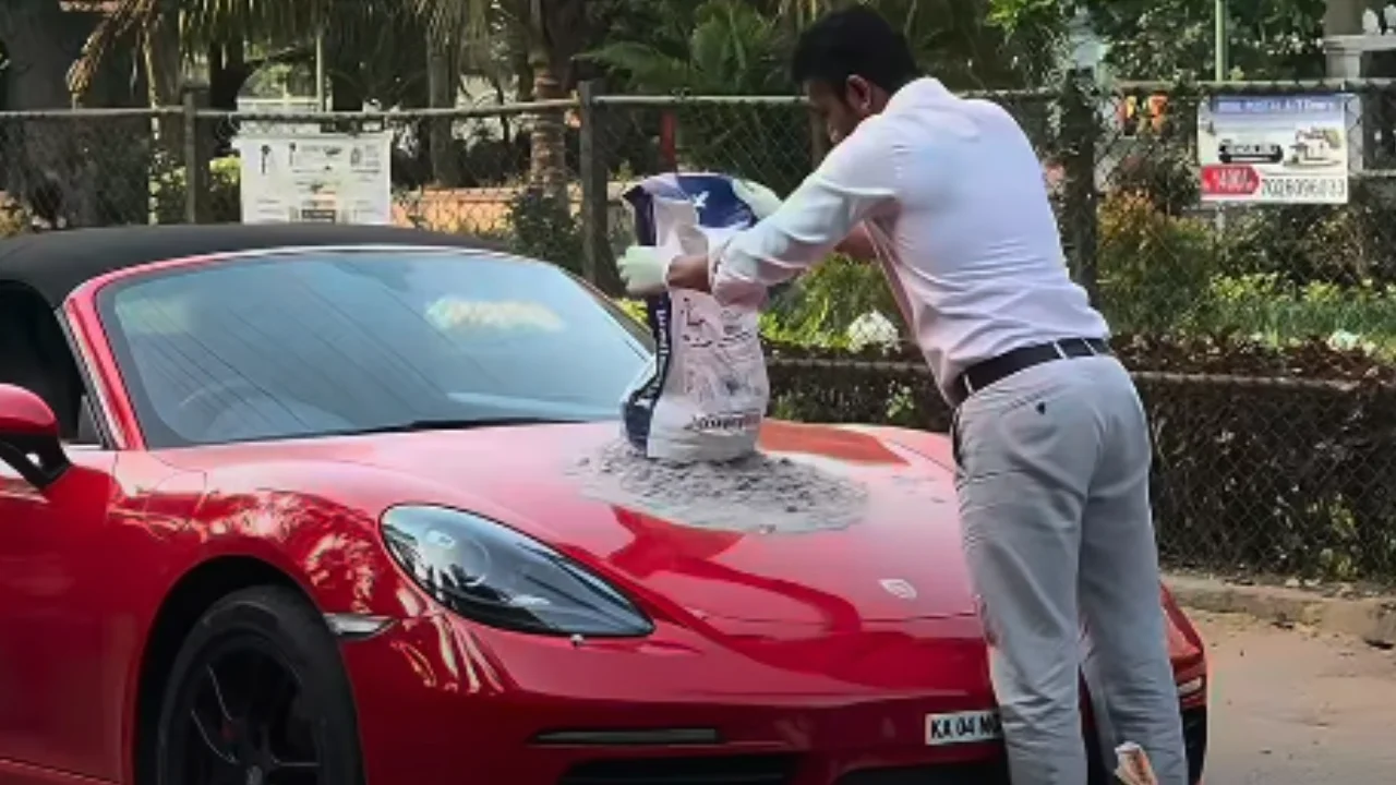 Porsche Boxster owner mixes concrete on his sports car’s hood!